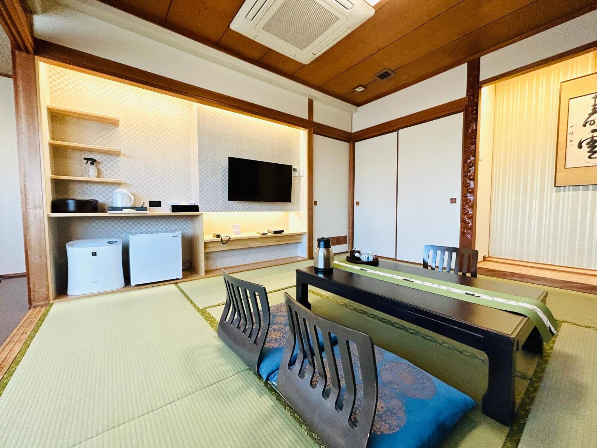 Hotel Takasago Коті Номер фото