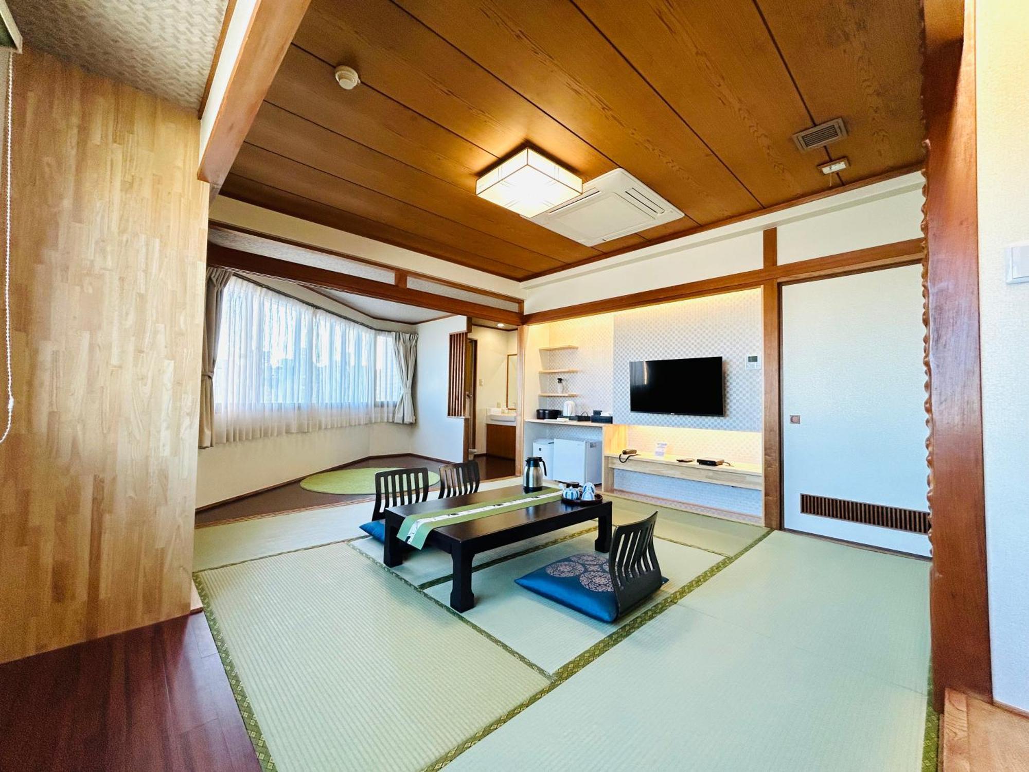 Hotel Takasago Коті Номер фото